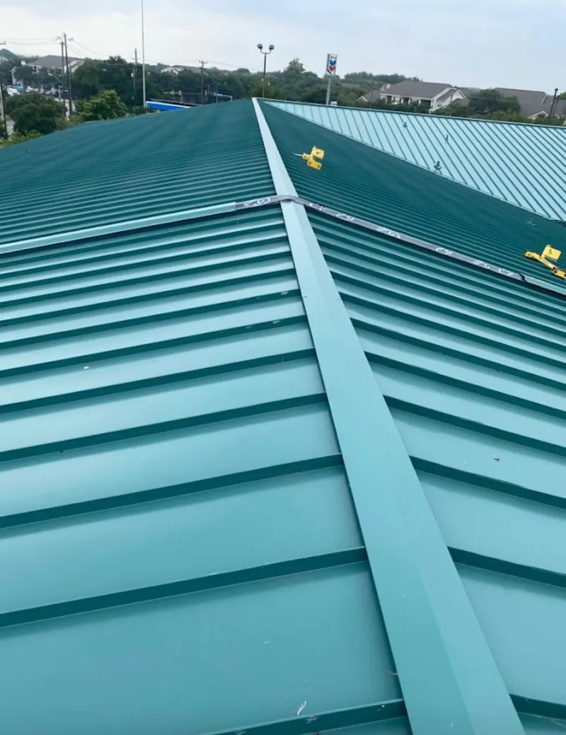 Green commercial metal roof ridge and valley for Metal Roof Repair in Guttenberg