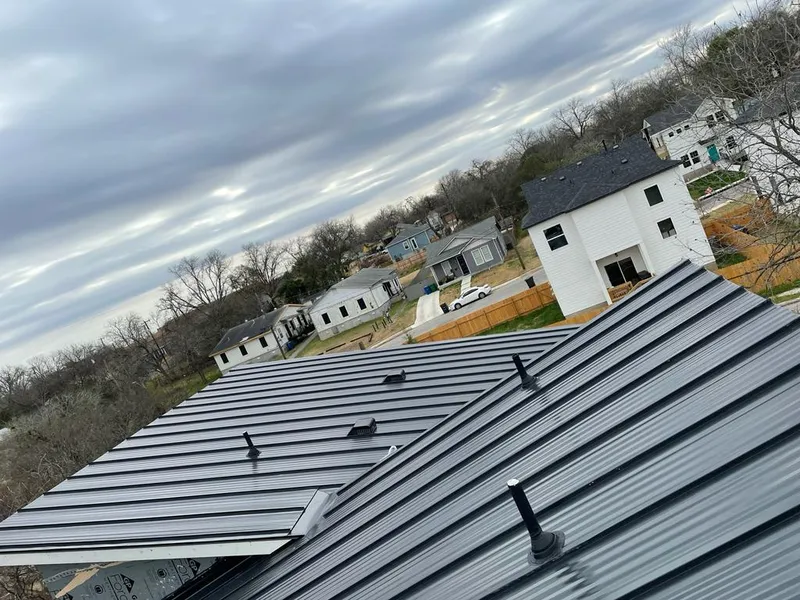 Standing seam metal roof panels with vents for Skylight Repair in Guttenberg